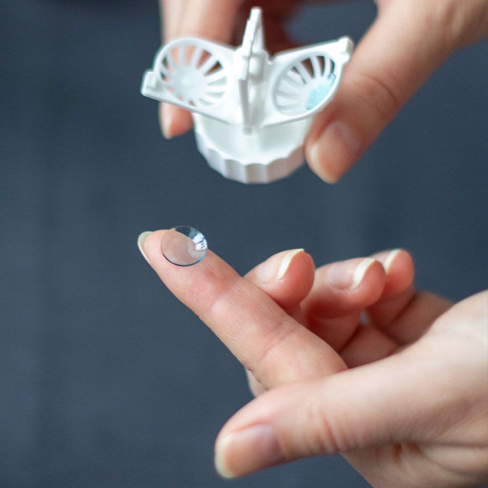 Contact lens and cleaning solution